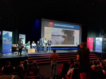 Winnaars op het podium van het project Bourgondische Buren